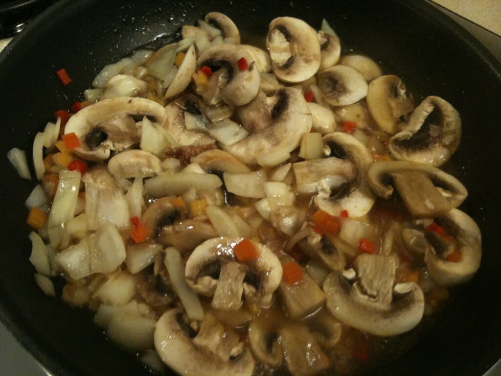 Mushrooms, red & yellow diced peppers and onion.